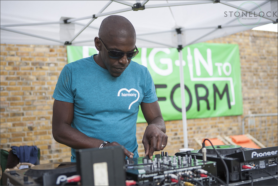 A DJ performs on his decks at the South Norwood Community Festival 2014