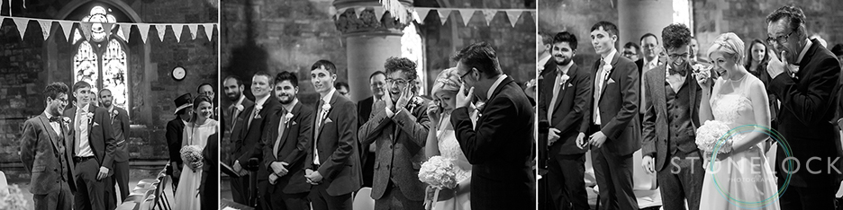 Wedding photo showing the emotions as the father of the bride walks his daughter down the aisle to meet the groom at Woodlands Church Bristol