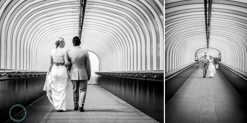 Bride and Groom walk down Festival Pier on the River Thames