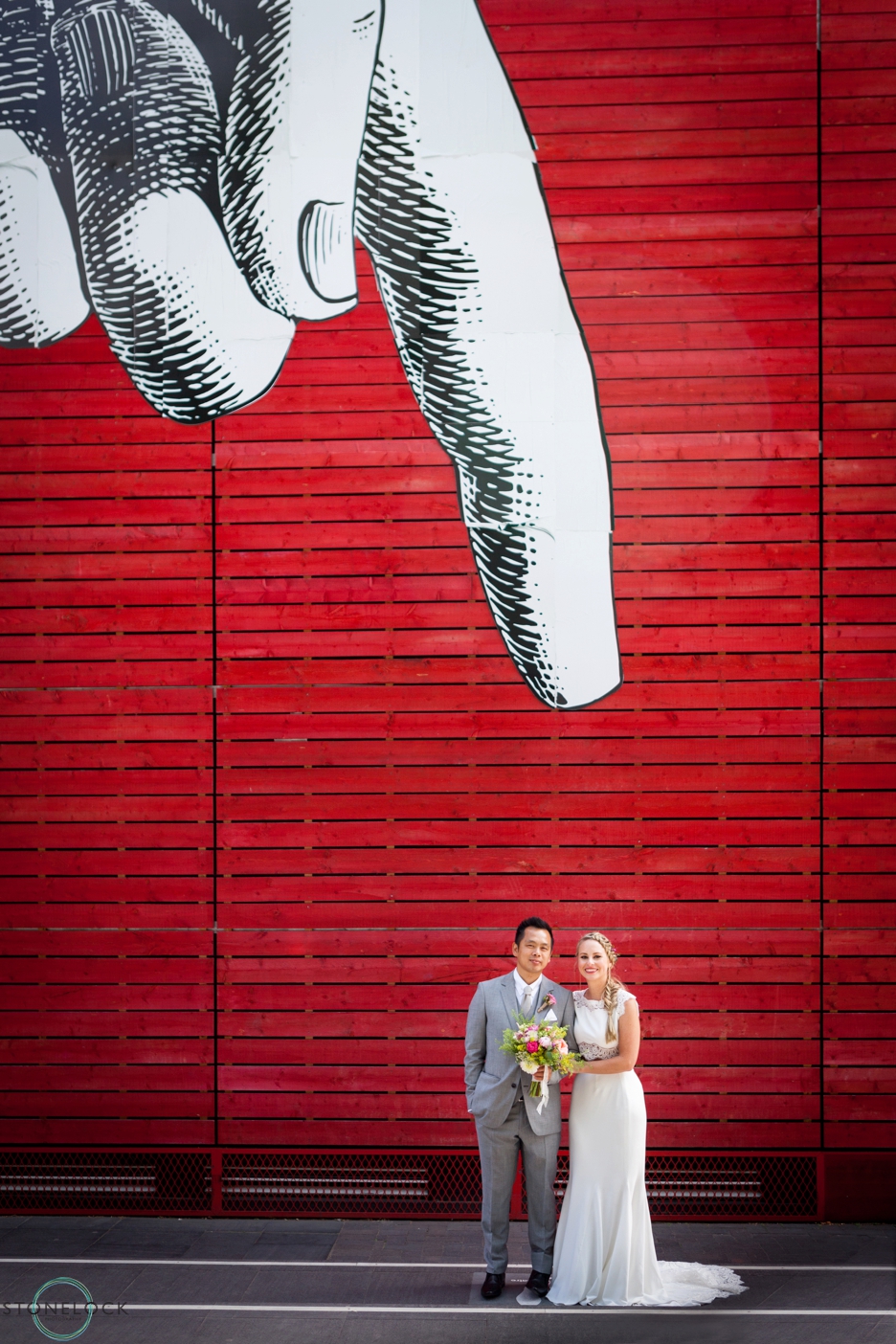 Bride and Groom outside the National Theatre on London's Southbank