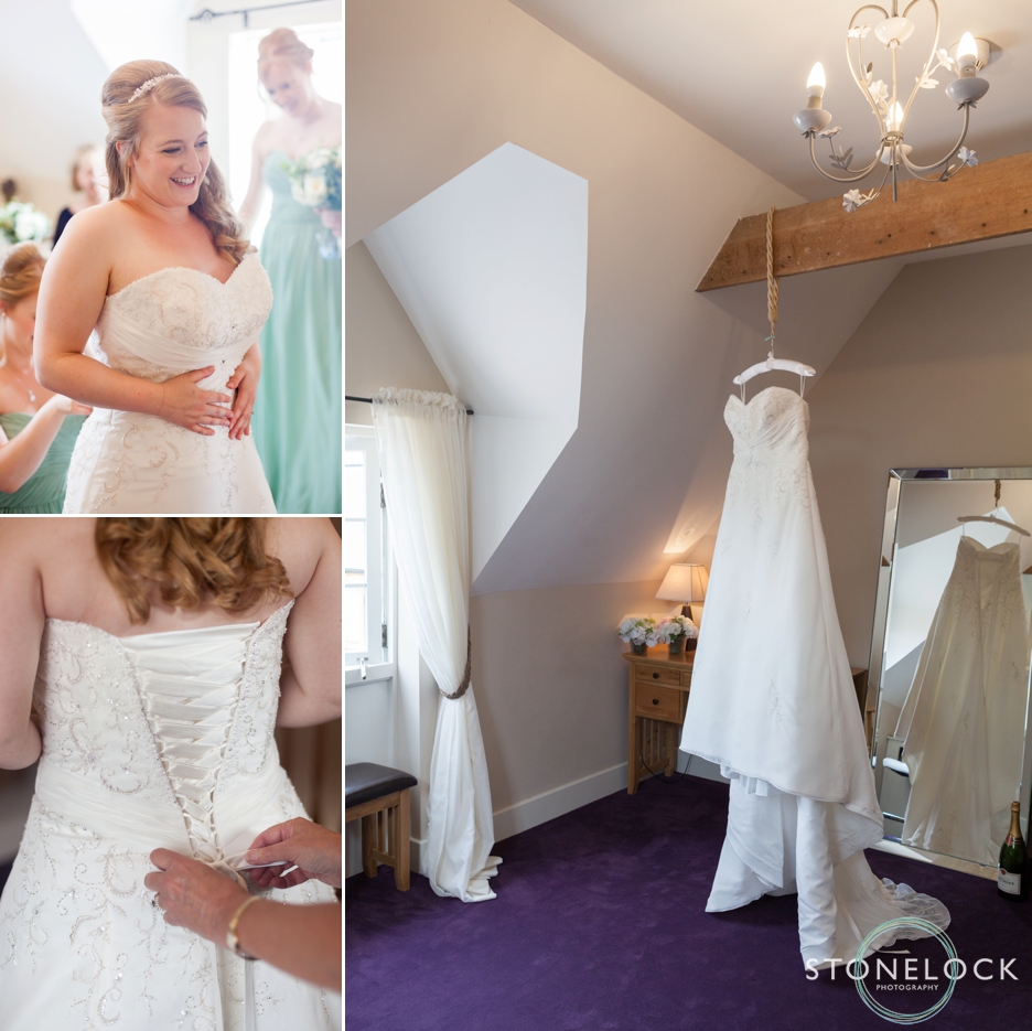 The bride getting ready for her wedding at Bassmead Manor Barns in Cambridgeshire