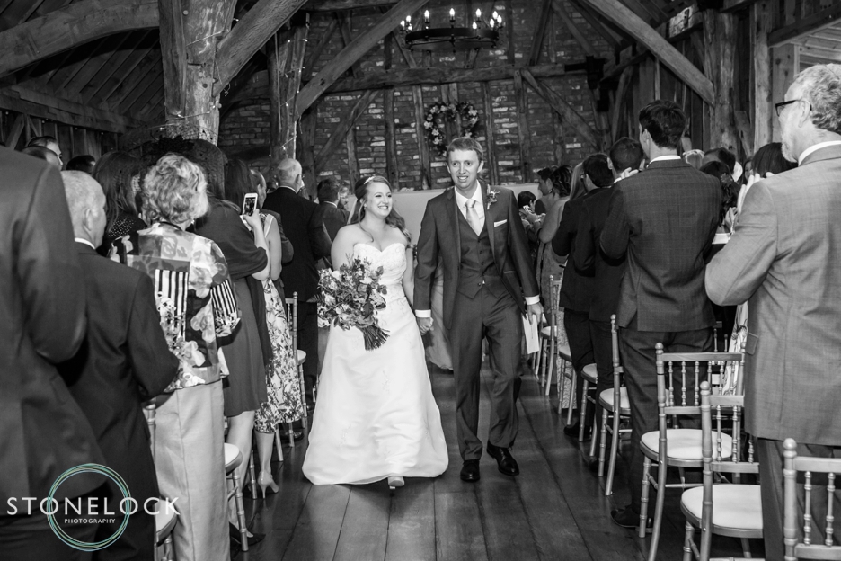 The wedding ceremony at Bassmead Manor Barns in Cambridgeshire