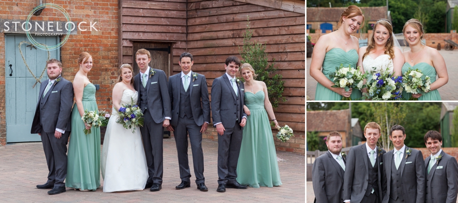 The bridal party pose for wedding photographs at Bassmead Manor Barns in Cambridgeshire