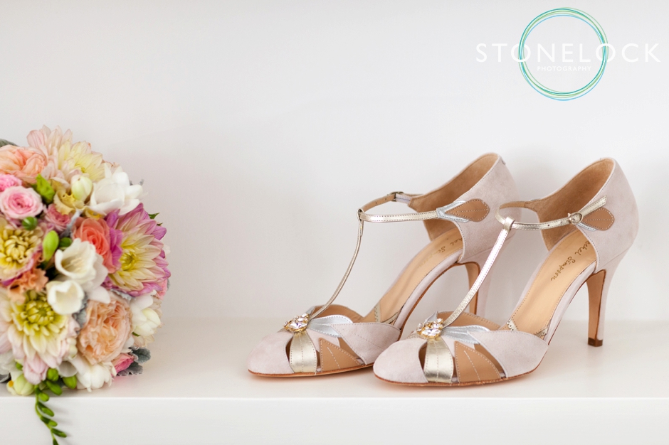The bride's shoes and bridal bouquet for her London wedding