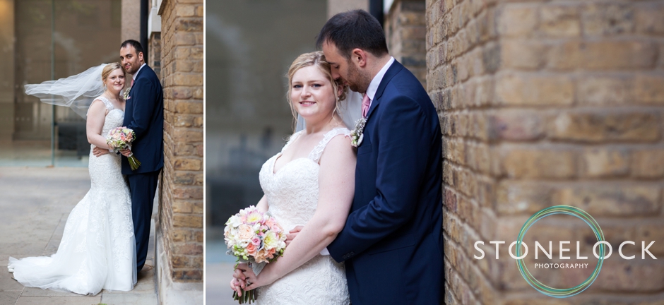 The bride and groom at Devonshire Square, Bishopsgate at a London wedding