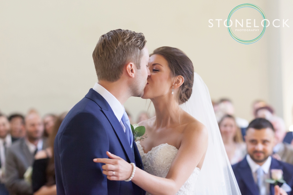 Farnham Castle, Surrey, Wedding photography, the bride & groom kiss
