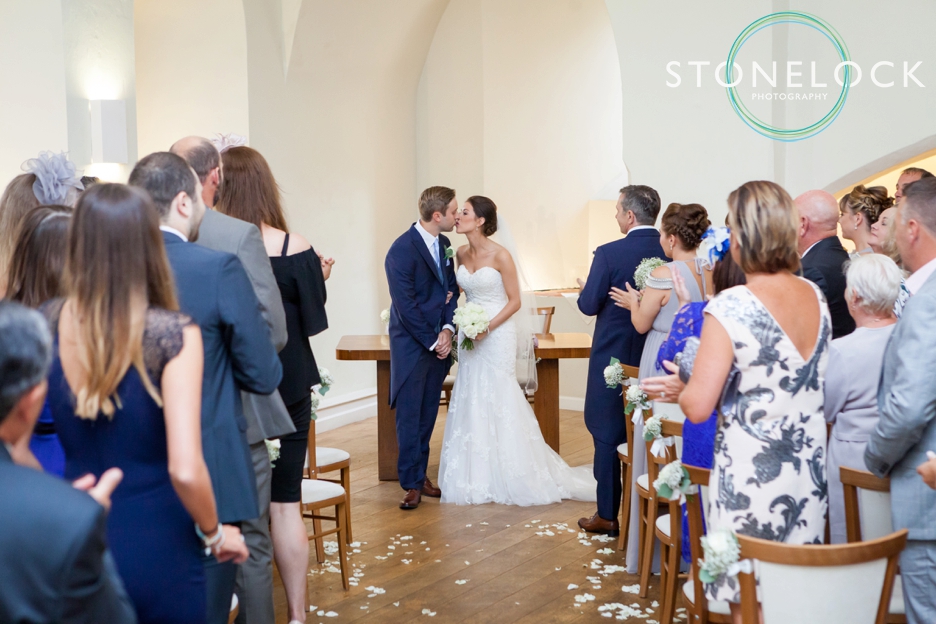 Farnham Castle, Surrey, Wedding photography, the bride & groom kiss