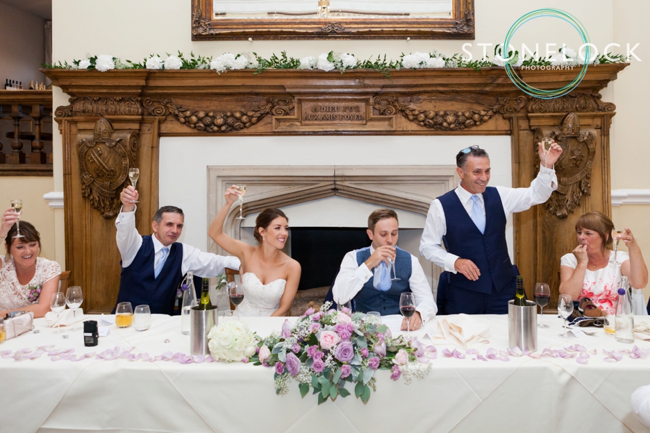 Farnham Castle, Surrey, Wedding photography, toasting the bride & groom