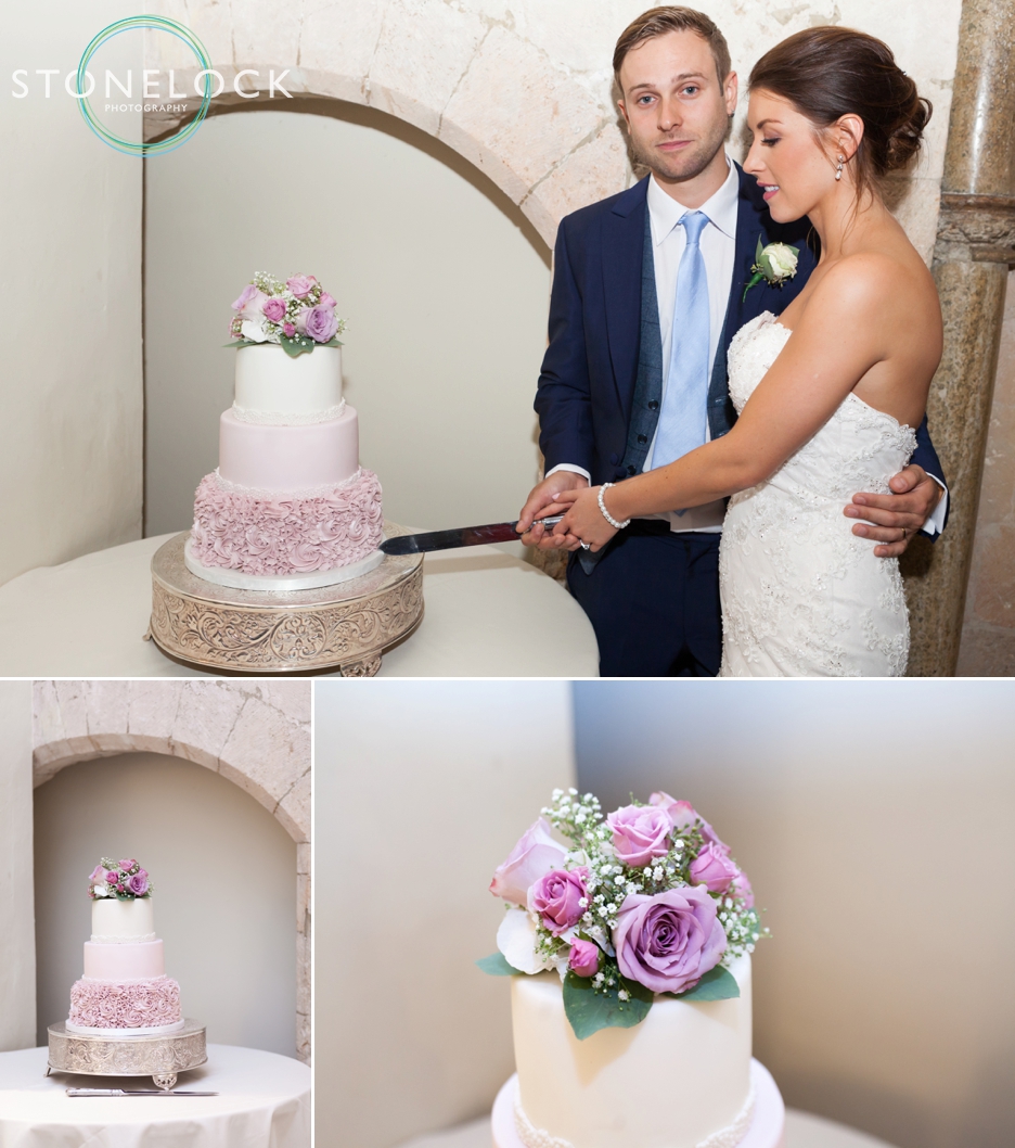 Farnham Castle, Surrey, Wedding photography, bride & groom cutting the wedding cake