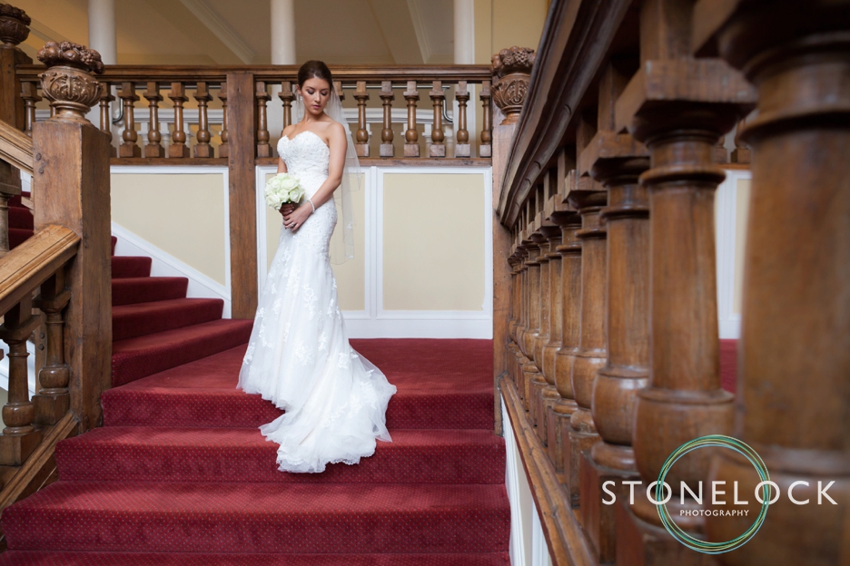 Farnham Castle, Surrey, Wedding photography, bride portrait photo on stairs