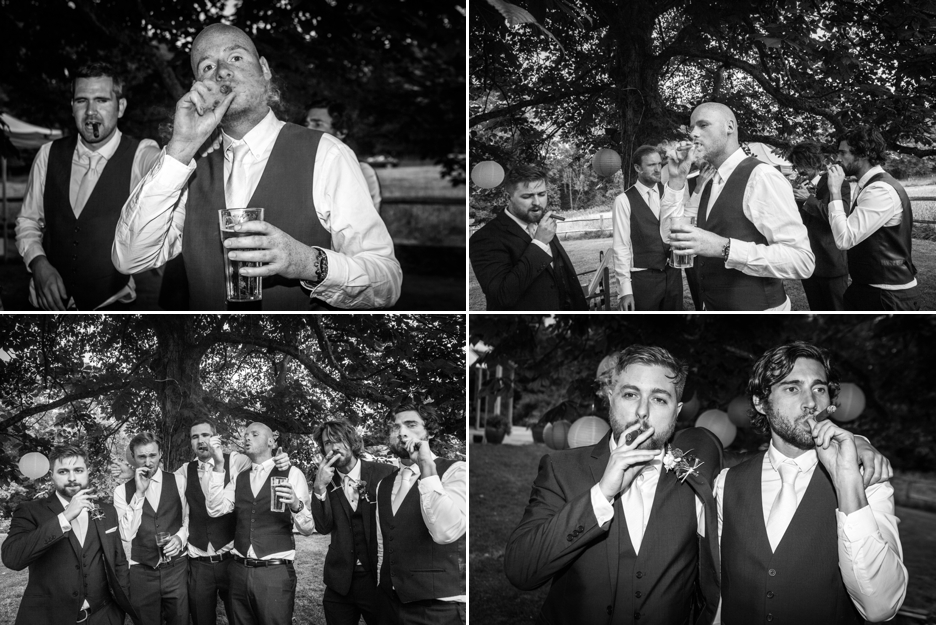 Wedding photography at Ridge Farm Studios, Dorking, Surrey, the groomsmen celebrate with a cigar