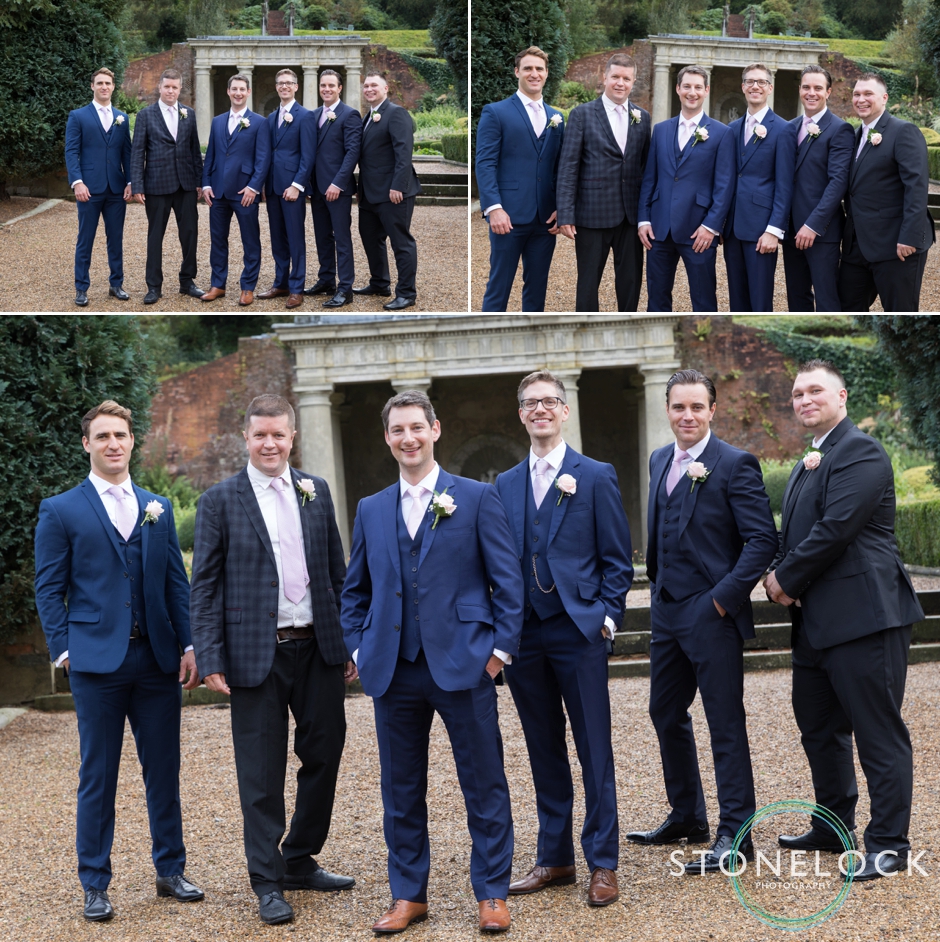 Wotton House wedding photography the groom with his groomsmen in the garden